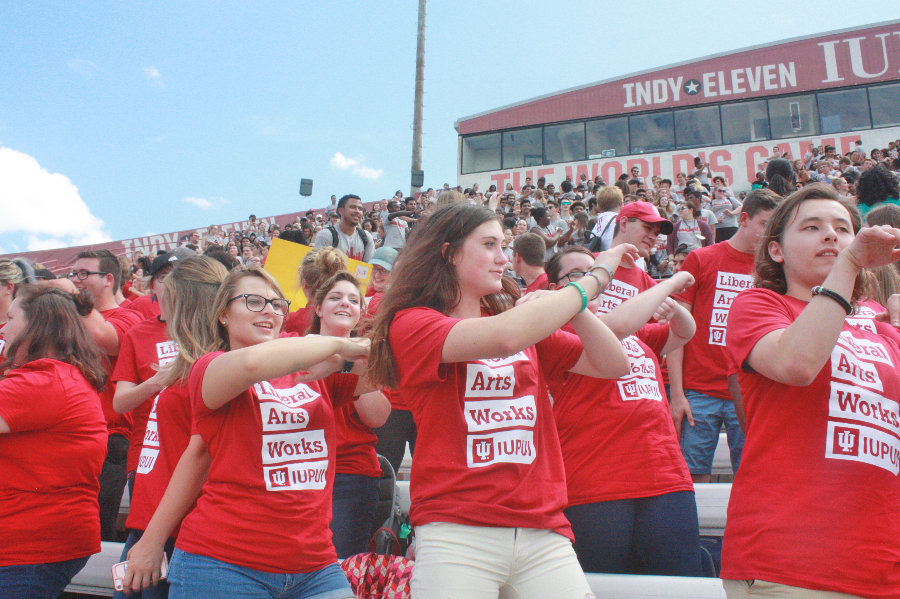 Liberal Arts Student cheering